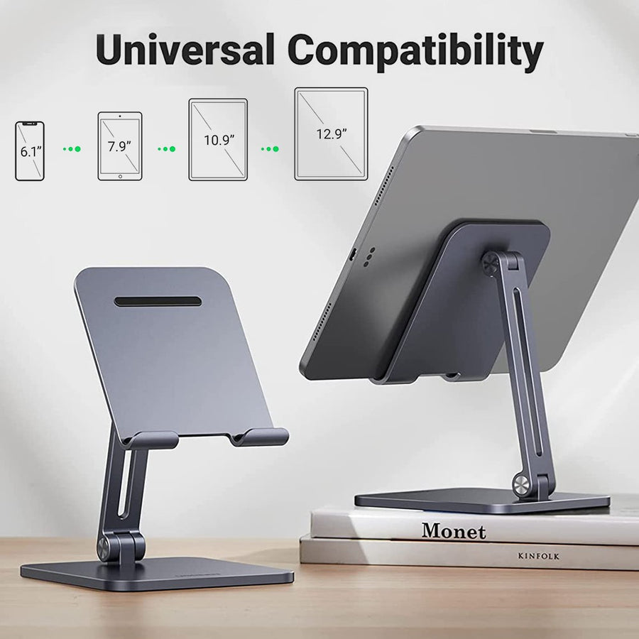 The stand beside a tablet on a desk, captioned universal compatibility from 6.7 to 12.9 inches