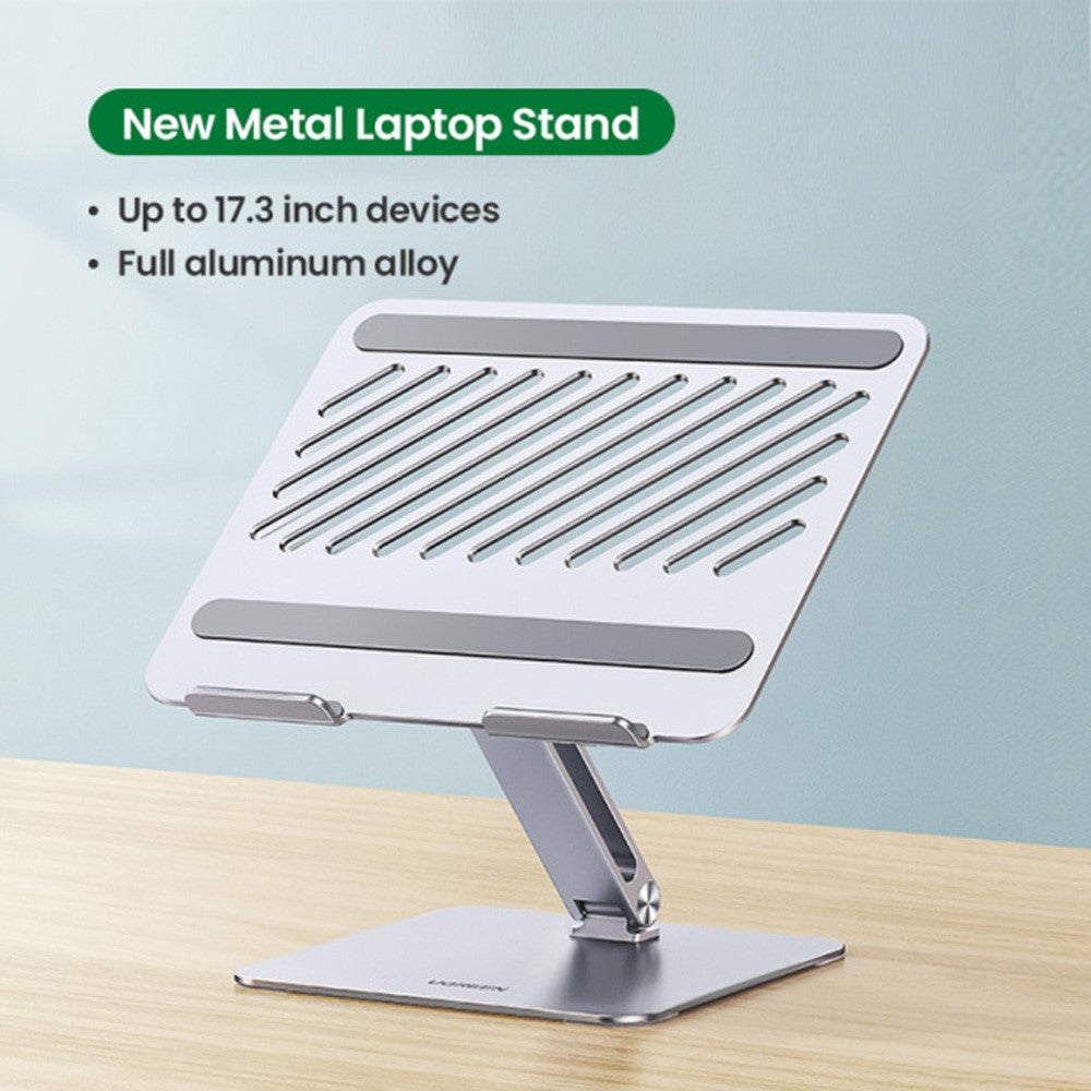 The laptop stand captioned new metal laptop stand, up to 17.3 inch devices, full aluminium alloy