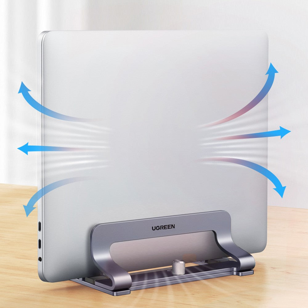 A closed laptop standing upright in the stand with airflow arrows around its open base