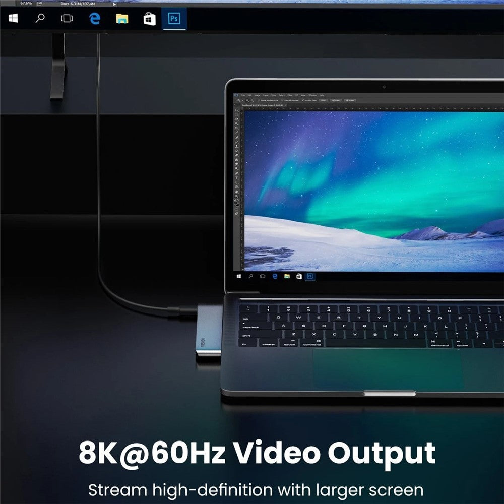 A laptop connected through the hub to a larger display, captioned 8K 60Hz video output