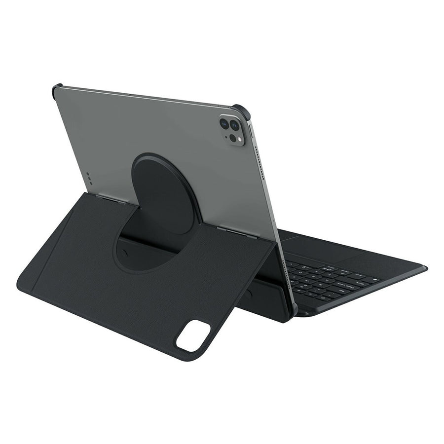 Rear three-quarter view of the black MagicEase case holding an iPad upright on its circular mount with the keyboard attached