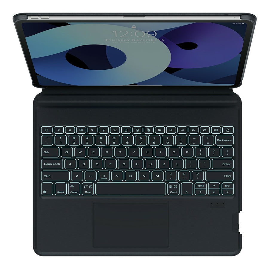 Top-down view of the black MagicEase keyboard with backlighting on, showing the full-size key layout and multi-touch trackpad