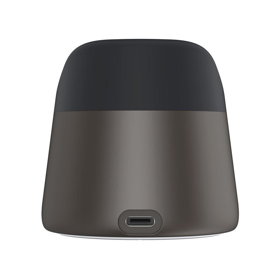 Underside of the Brown RayDock charging dock showing the USB-C input port set into the base