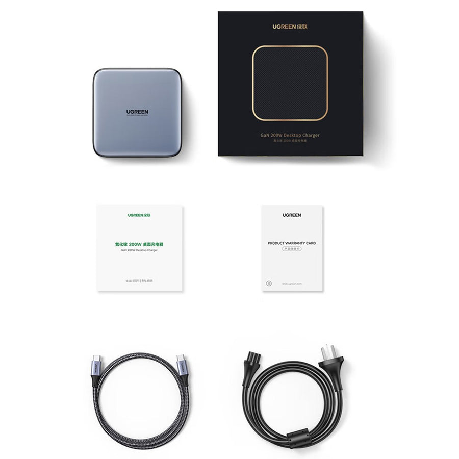 Everything in the box: the charger, its retail box, a quick start guide, a warranty card, a power cord and a USB-C cable
