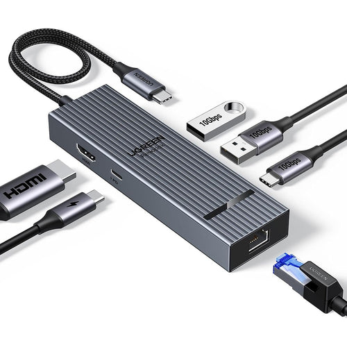 UGREEN 45364 6-in-1 USB-C hub in grey aluminium, angled to show HDMI, USB-A, USB-C and Ethernet cables plugged in