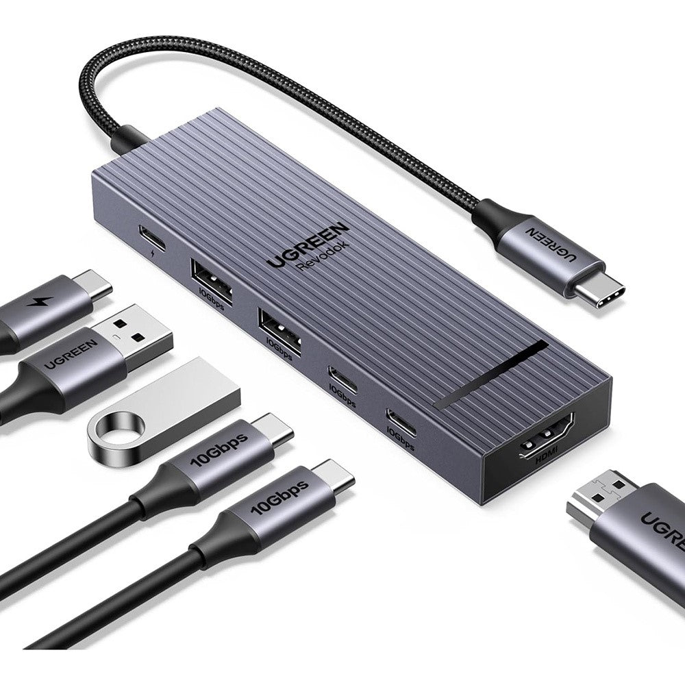 UGREEN 45363 6-in-1 USB-C hub in grey aluminium with USB-A, USB-C and HDMI cables plugged in