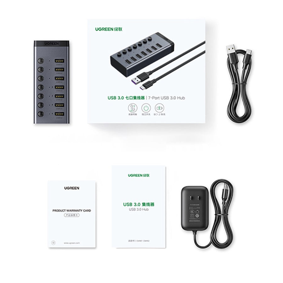 Everything in the box: the hub, its retail box, a data cable, a warranty card, a manual and a power adapter