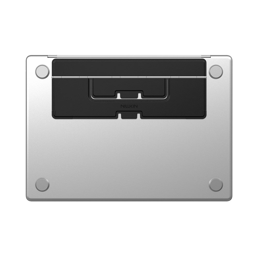 Underside of a silver laptop with the black Dual Wing stand adhered across the base and folded flat