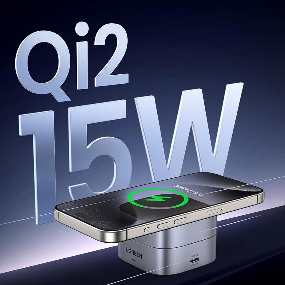 An iPhone charging flat on the pad, captioned Qi2 15W