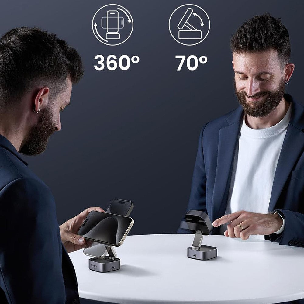 A man adjusting the charger on a table, captioned 360 degrees of rotation and 70 degrees of tilt